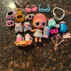 L.O.L. Surprise! Doll with Pink and Blue Accessories